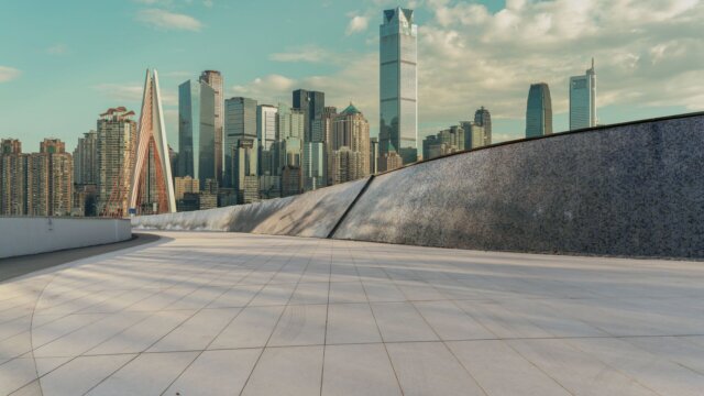 An empty square floor in the modern park during sunrise
