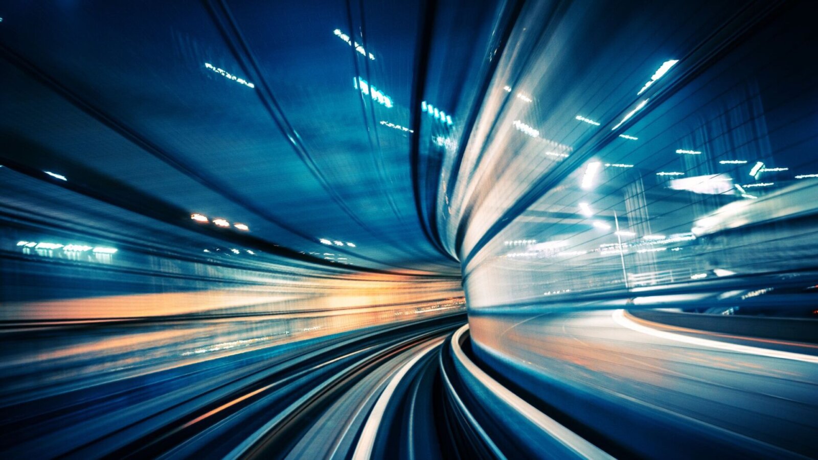 Motion-blurred view of moving train.